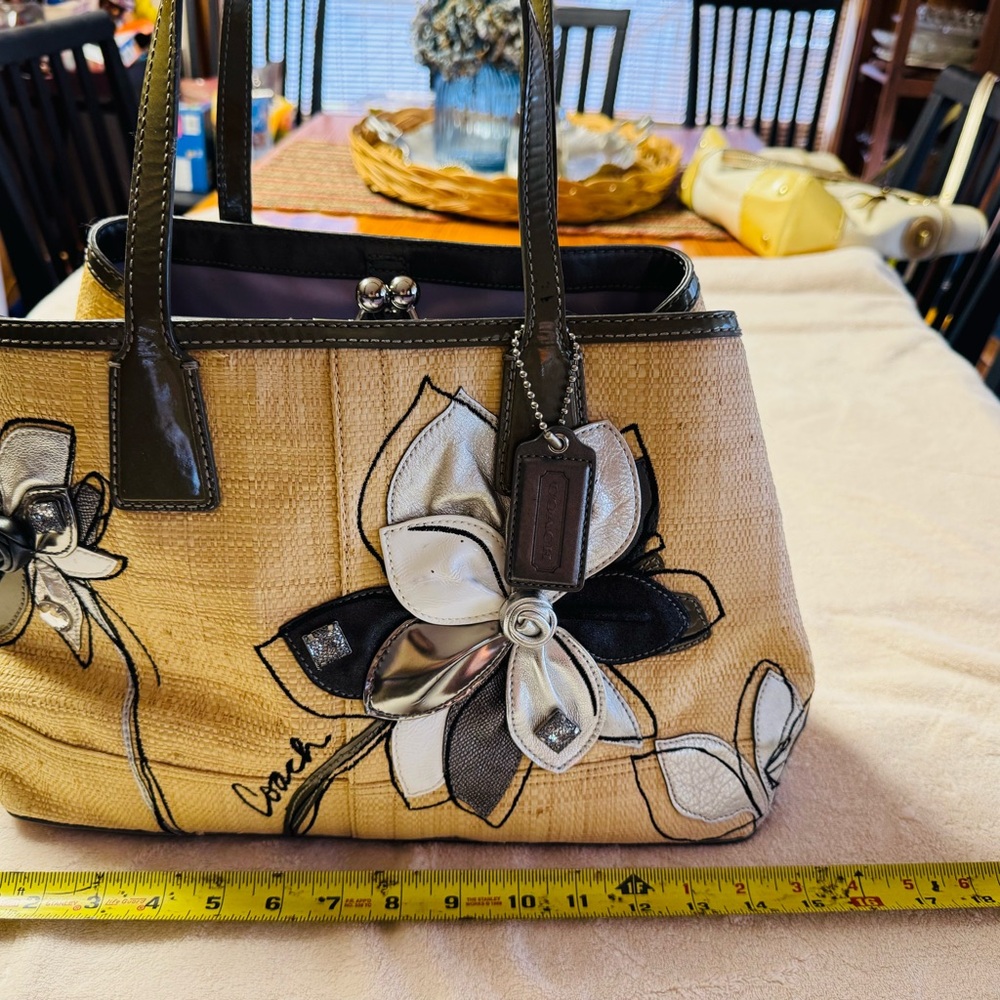 Coach Hamptons 10th anniversary edition. Silver and Black Floral on tan.